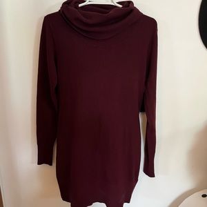 Long burgundy sweater.